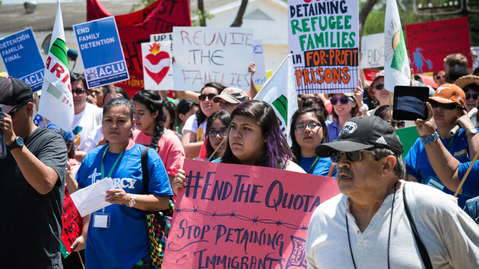 Group of individuals at Detention Watch Network protest